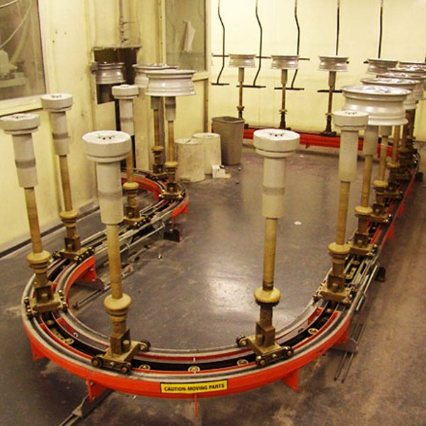 Car wheels on a MCM Dualtrack 100 Conveyor