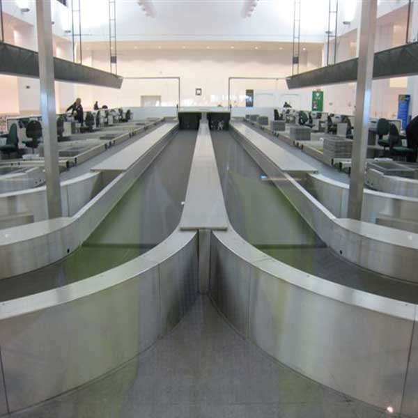 Curve di cintura per i sistemi di movimentazione bagagli in aeroporto Belt Curves for Airport Baggage Handling Systems