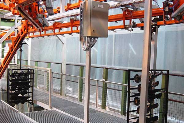 Parti di sospensione su un trasportatore a nastro trasportatore MCM AT100 Suspension parts on a MCM AT100 Power & Free Conveyor